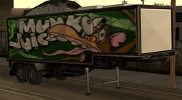 A semi trailer sporting Munky Juice livery.