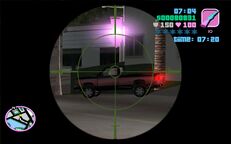 Tommy Vercetti about to shoot Marcus Hammond or Franco Carter in a Bobcat in Vice Point.