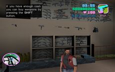 Tommy Vercetti looking at the selection of weapons at Ammu-Nation.