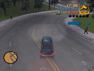 Claude driving in Shoreside Vale, about to attract the attention of one of Catalina's death squads.