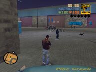 Claude shooting the Colombian Cartel death squads car, as a Yakuza gangster waits for them to leave their car.