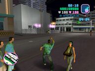 Tommy Vercetti throwing a grenade at the DBP Security building.