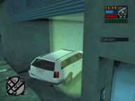 Toni Cipriani parking the Sindacco Argento in a garage at The Dolls House.
