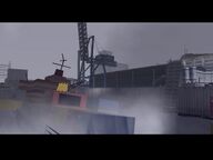 The destroyed freighter sinking.