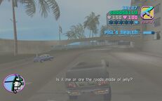 Tommy Vercetti driving Phil Cassidy to the hospital.