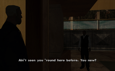 Carl Johnson talks to a guard at the staff door.