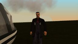 Massimo Torini about to enter his helicopter.