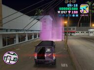 Tommy Vercetti and Rico about to deliver the Haitian van at Café Robina.