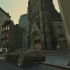Car theft shot of an early GTA IV Coquette, with no decals on its rear.