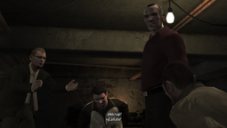 Dimitri Rascalov attempting to calm Mikhail Faustin down.