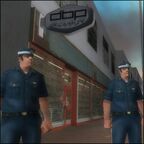 Two Patrol Invest Group security guards standing in front of DBP Security Headquarters in Grand Theft Auto:Vice City.