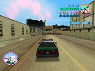 Tommy Vercetti arriving at the junkyard.