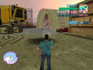 Tommy Vercetti shooting the two men guarding Lance Vance.