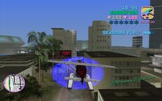 Tommy Vercetti about to fly through a blue corona above Downtown.