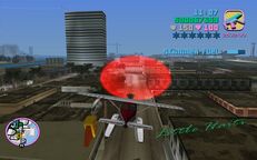 Tommy Vercetti about to fly through a red corona above Little Haiti.
