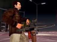 Toni wielding a Flamethrower in GTA Liberty City Stories.