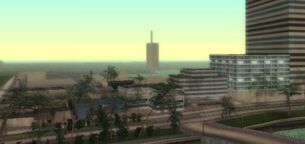 The same tower in GTA Vice City Stories, as seen from over Starfish Island.