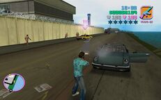 Tommy Vercetti shooting at the second rival Taxi.