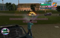 Tommy Vercetti destroying the final rival Taxi, with the "Mission Passed!" message starting to show.