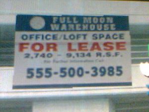 Full Moon Warehouse poster seen outside homes.