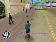 Tommy Vercetti about to collect the briefcase of money.