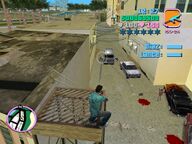 Tommy Vercetti shooting two Haitians by the Burrito.