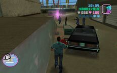 Tommy Vercetti about to pick up the counterfeit plates.