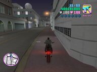 Tommy Vercetti lining up to use the stairs as a ramp to access the Sharks compound.