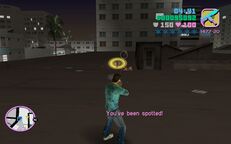 Tommy Vercetti shooting a Sharks gangster.