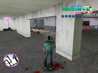 Tommy Vercetti shooting a Sharks gangster, with Mitch Baker's motorcycle visible.