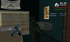 Carl sneaks an ammunition crate past a sleeping Colonel Fuhrberger.