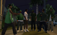 CJ, Sweet, and Ryder rallying up some gang members and preparing themselves against the incoming Ballas assault on Grove Street.