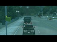 The police convoy leaving for Portland.