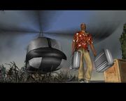 Victor Vance walking away from the helicopter, piloted by his brother, with two briefcases full of drugs.