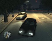Niko and Roman driving away from the pursuing Albanians.