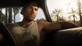 Jason is sitting in "his" car