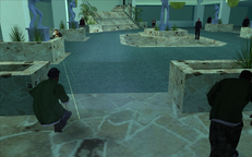 Carl Johnson arrives to help Big Smoke fend off the Russian gunmen.
