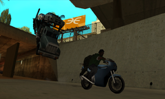 A Russian-commandeered truck speeds off a road in pursuit of Carl and Smoke.