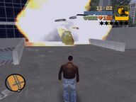 The Police Car exploding after the bomb was remotely detonated by Claude.