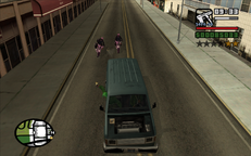 CJ drives the sound van to the garage while chased by the police.