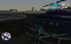 Tommy Vercetti about to escape in a helicopter.