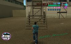 Tommy Vercetti about to go up the stairway to the roof of Bakery & Cafeteria.
