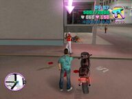 Tommy Vercetti shooting the drug dealer.