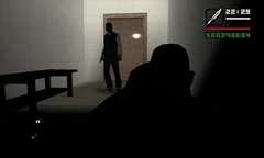 Carl waits silently in the shadows for his chance to take out the guard.