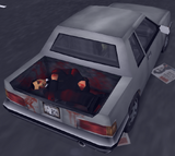 Trunk area of the "corpse" Manana (with the trunk cover removed) featured in "Dead Skunk in the Trunk" in GTA III.