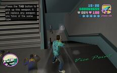 Tommy Vercetti shooting an FBI agent.