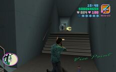 Tommy Vercetti shooting a PIG officer.