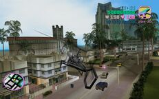 Tommy Vercetti, in the helicopter, following Candy Suxxx in the limousine.