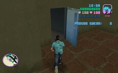 Tommy Vercetti entering the WK Chariot hotel through a rear entrance.