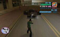 Tommy Vercetti shooting a car to draw attention.